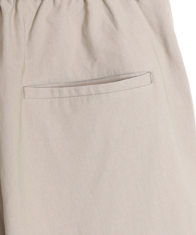 ストレッチ テーパード パンツ